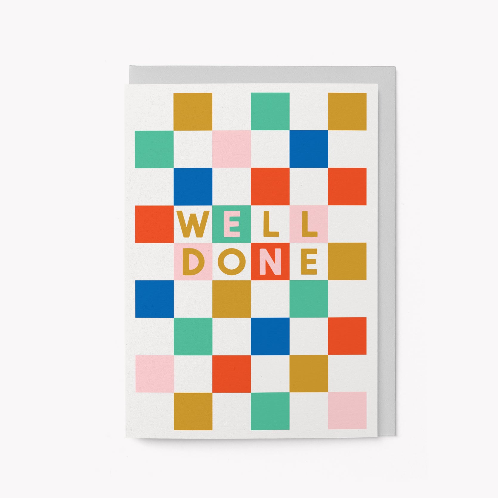 A colorful checkered pattern greeting card with the text 'WELL DONE' in bold letters.