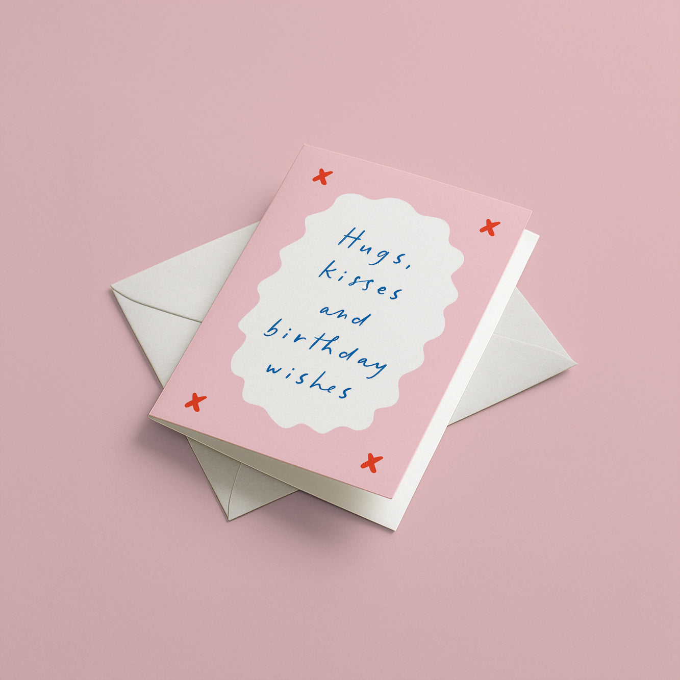 Pink birthday card with 'Hugs, kisses and birthday wishes' text on a pink background