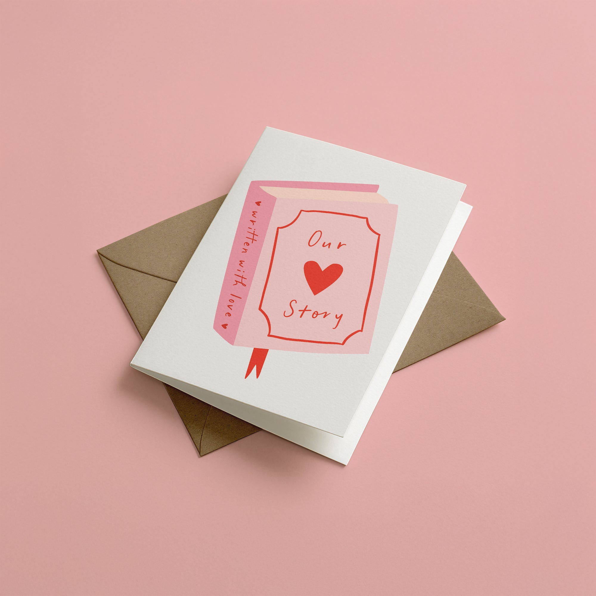 Love story greeting card with kraft envelope on a pink background