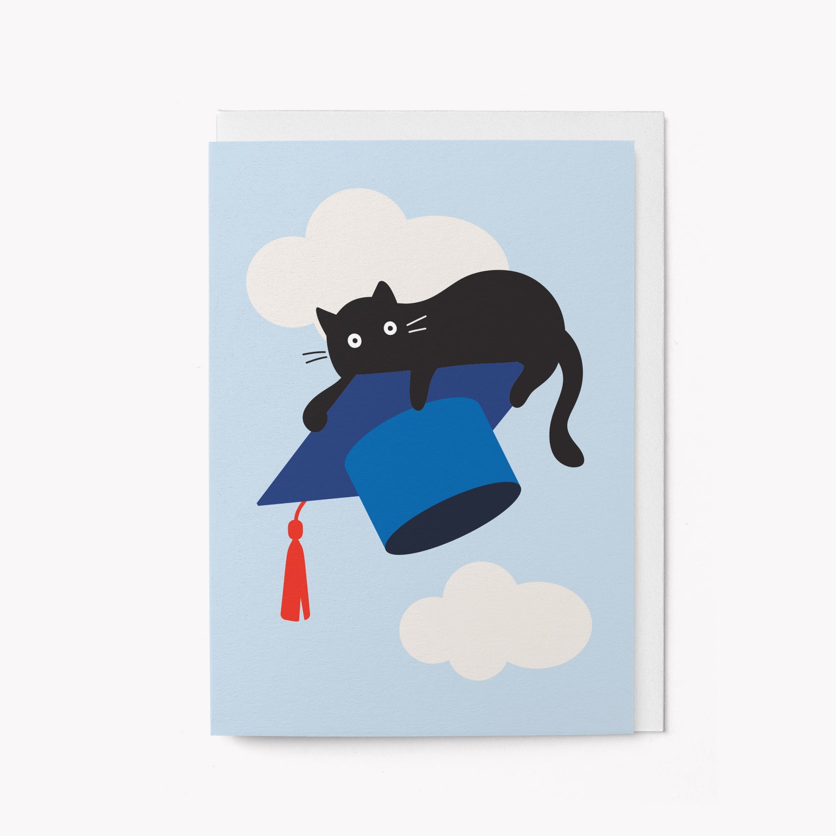 Greeting card of a black cat on a blue graduation cap with clouds on a light blue background.