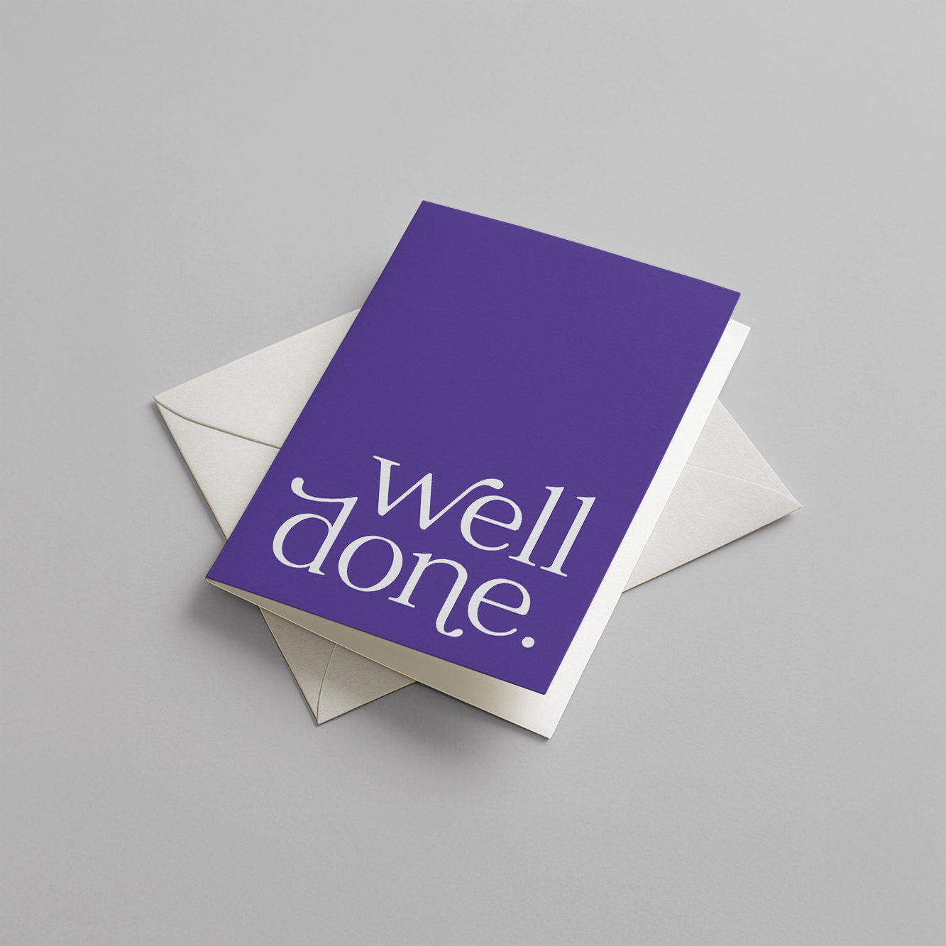 Purple card with 'well done' text on a gray background
