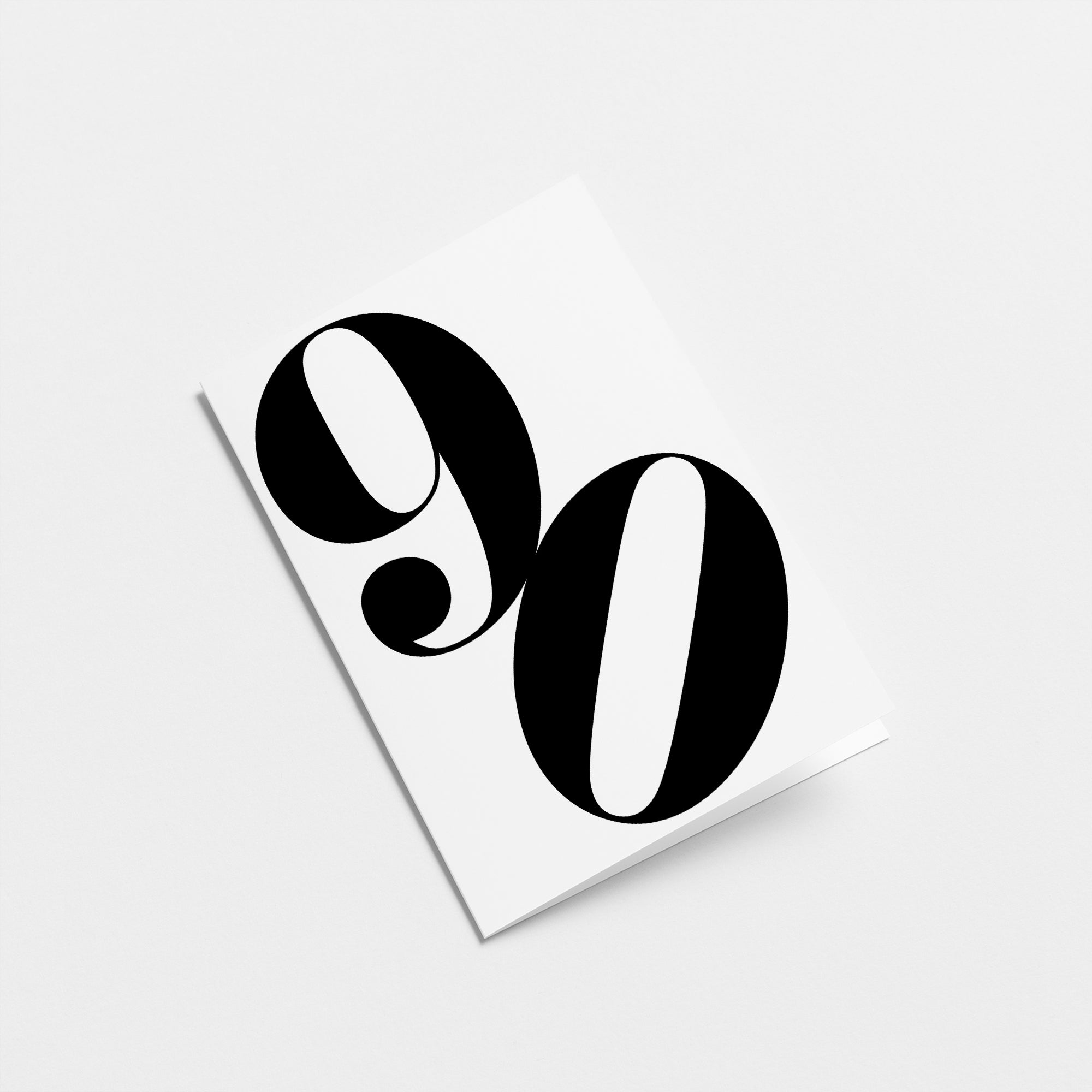 white 90th milestone age card with black number 90 Edit alt text