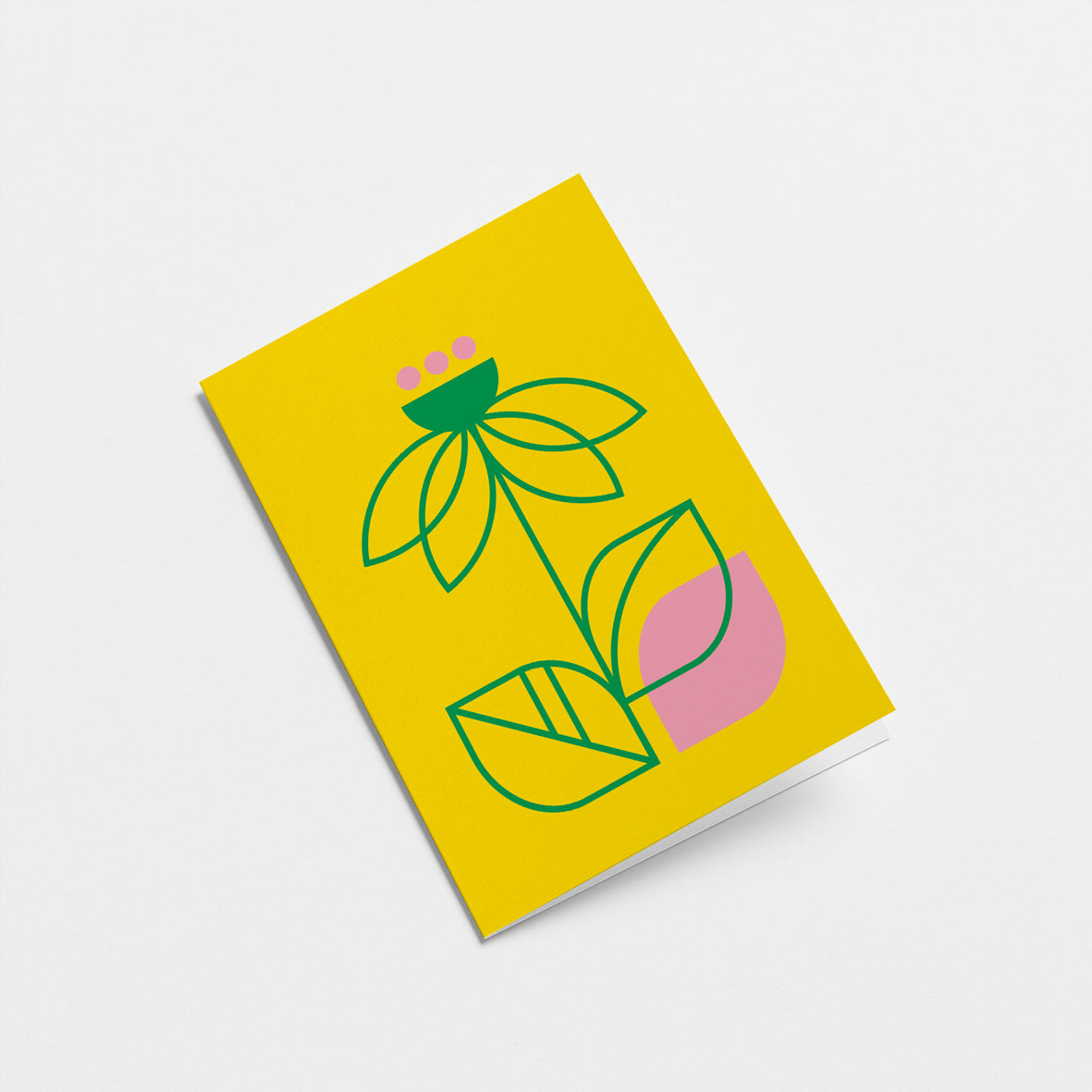 everyday greeting card with a green flower and leafs and a pink leaf Edit alt text