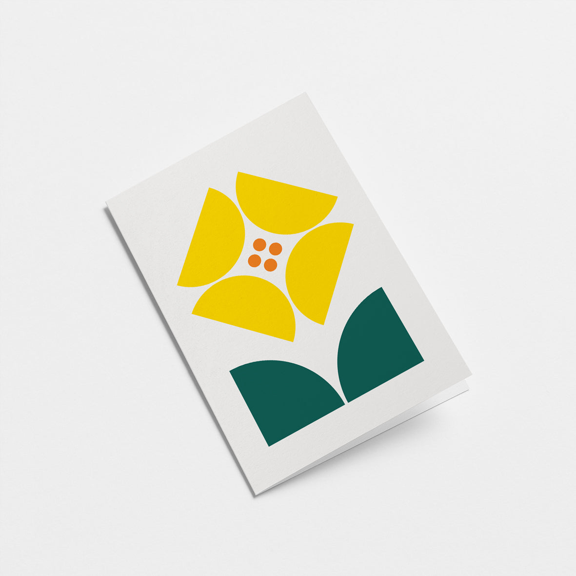 everyday greeting card with yellow flower and dark green leafs