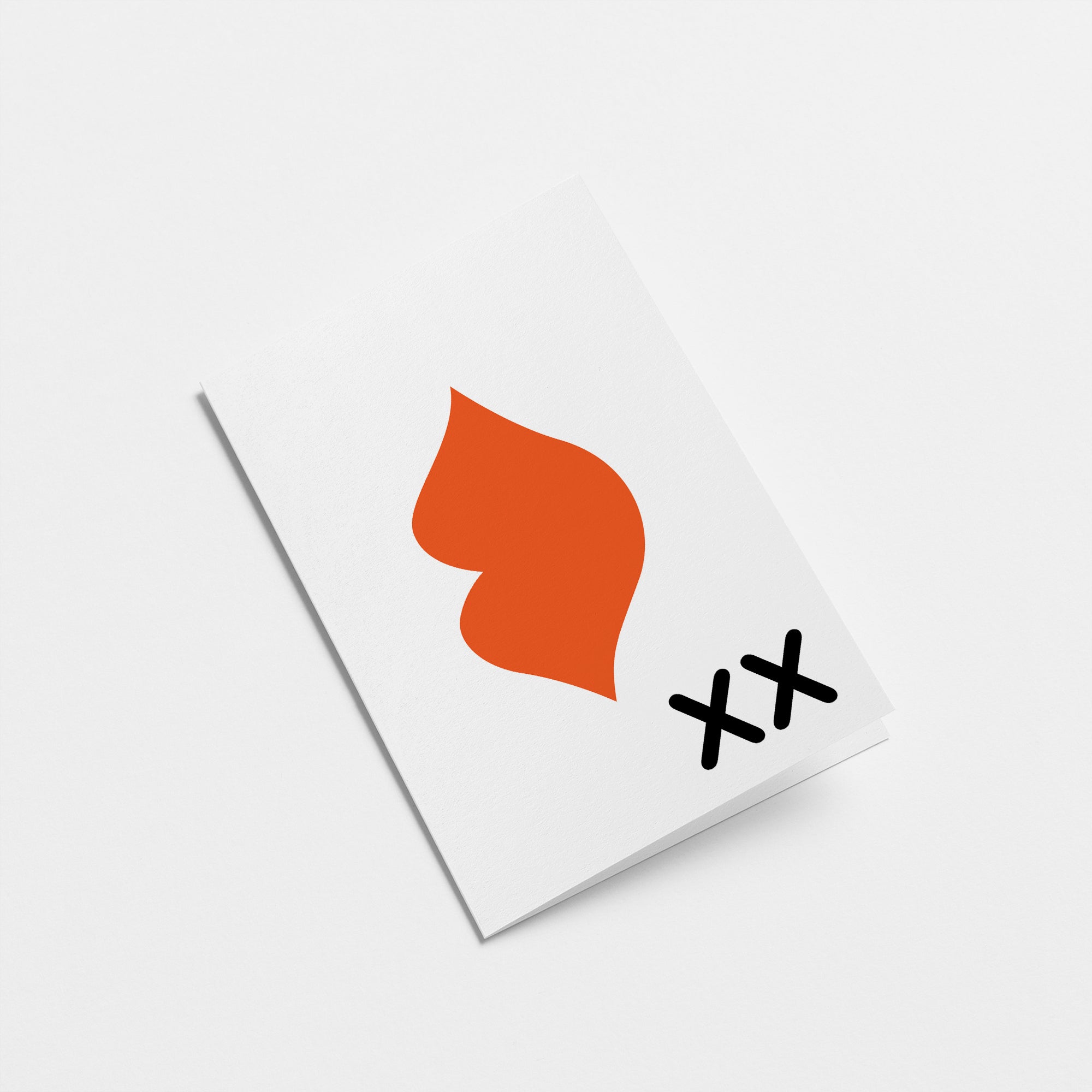 love card with red lips drawing and xx Edit alt text