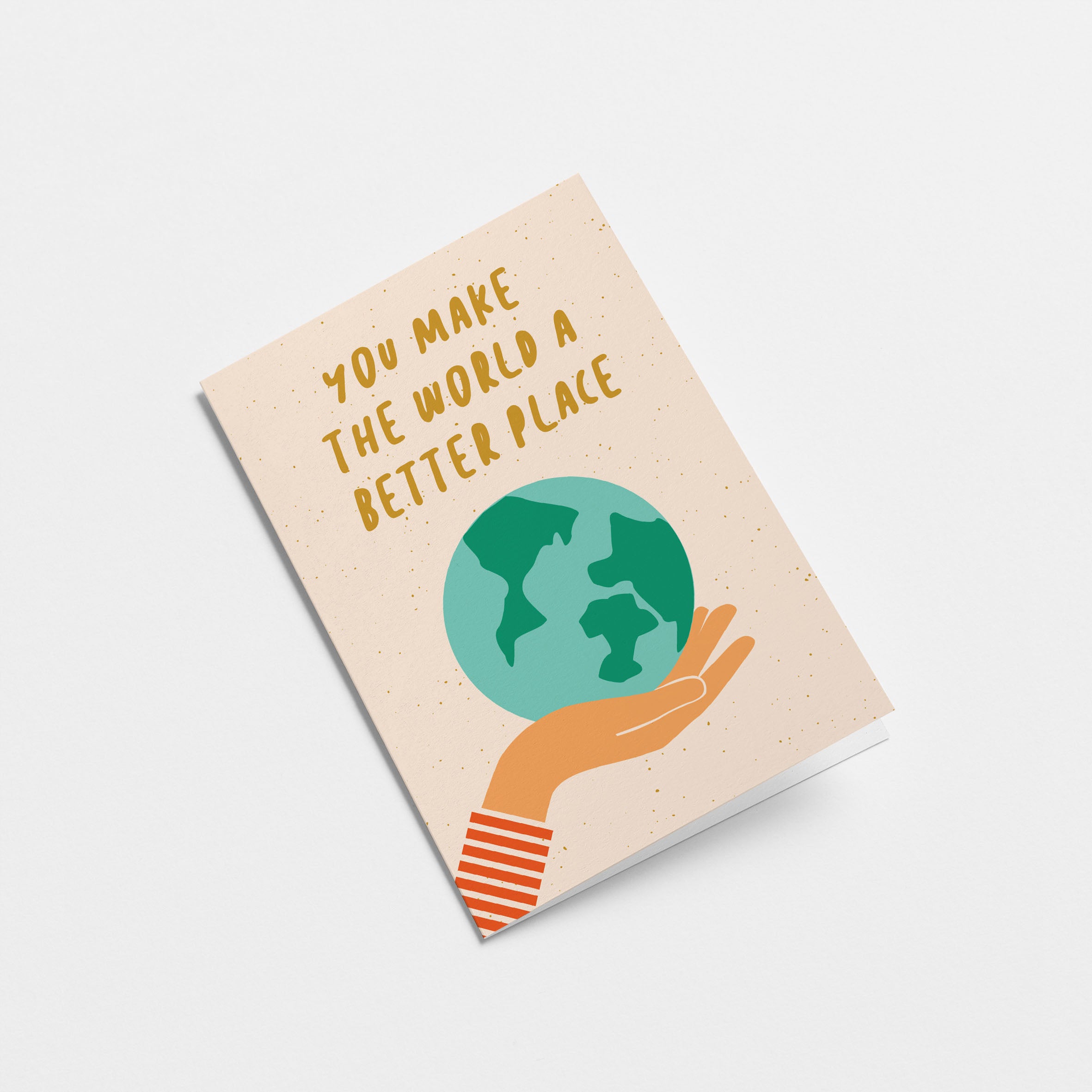 greeting card with earth on the palm of a hand with a text that says you make the world a better place Edit alt text