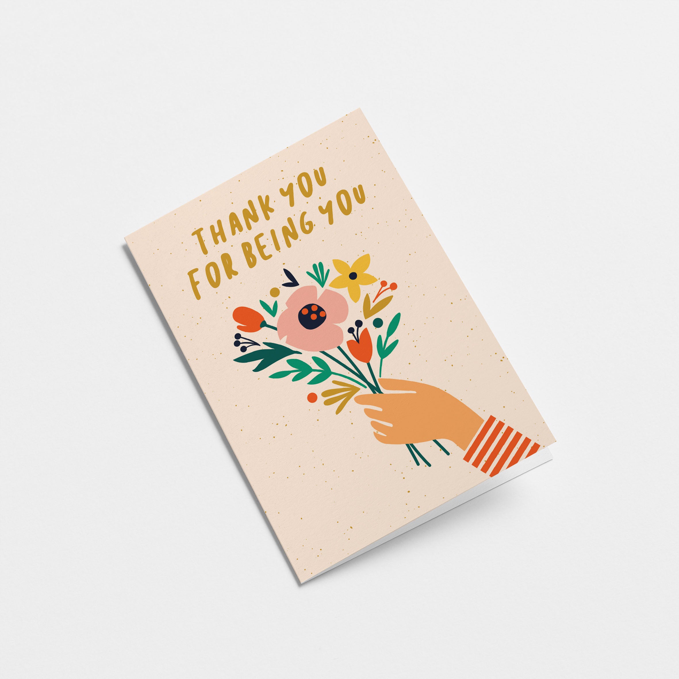friendship card with a hand holding colorful flowers and a text that says thank you for being you Edit alt text