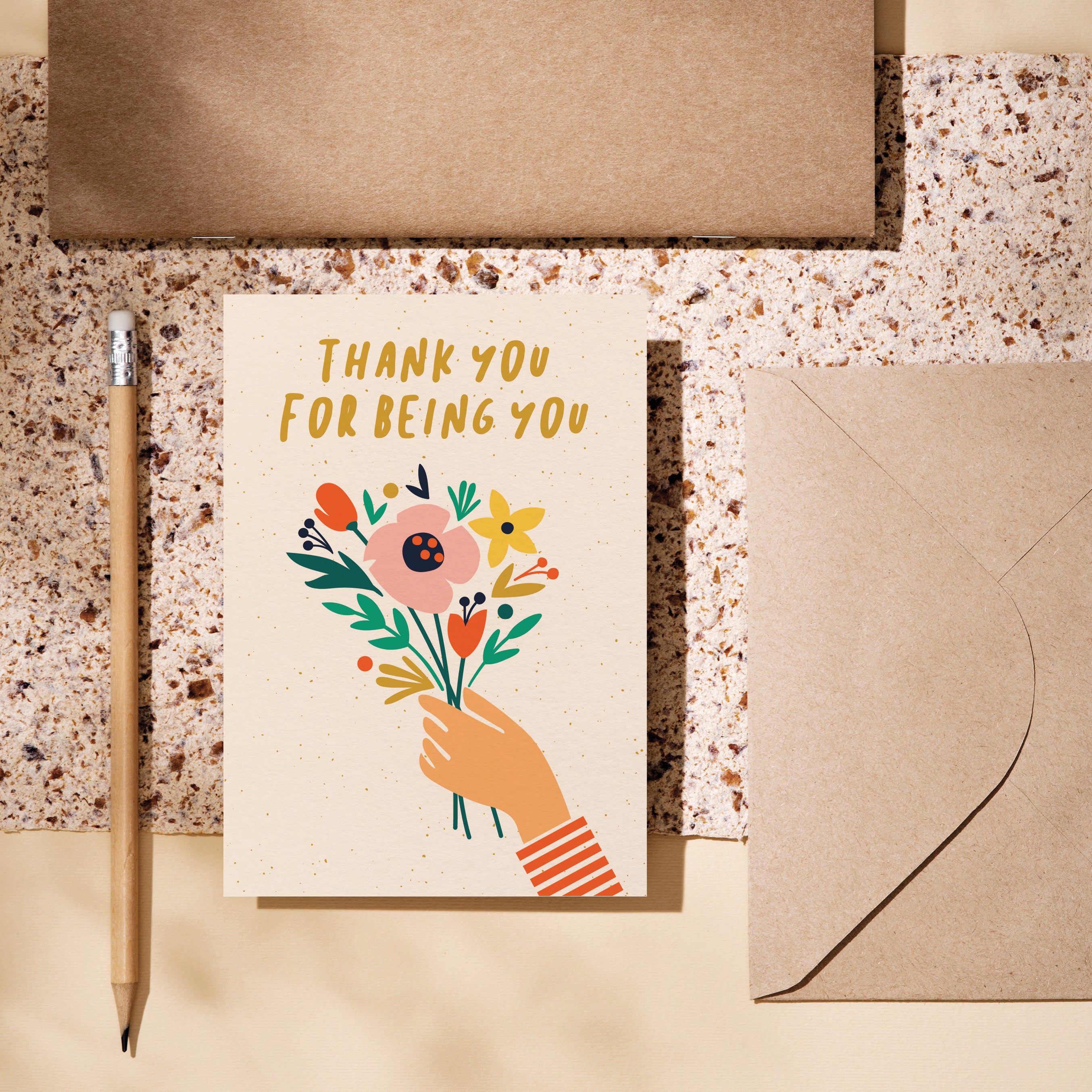 friendship card with a hand holding colorful flowers and a text that says thank you for being you Edit alt text