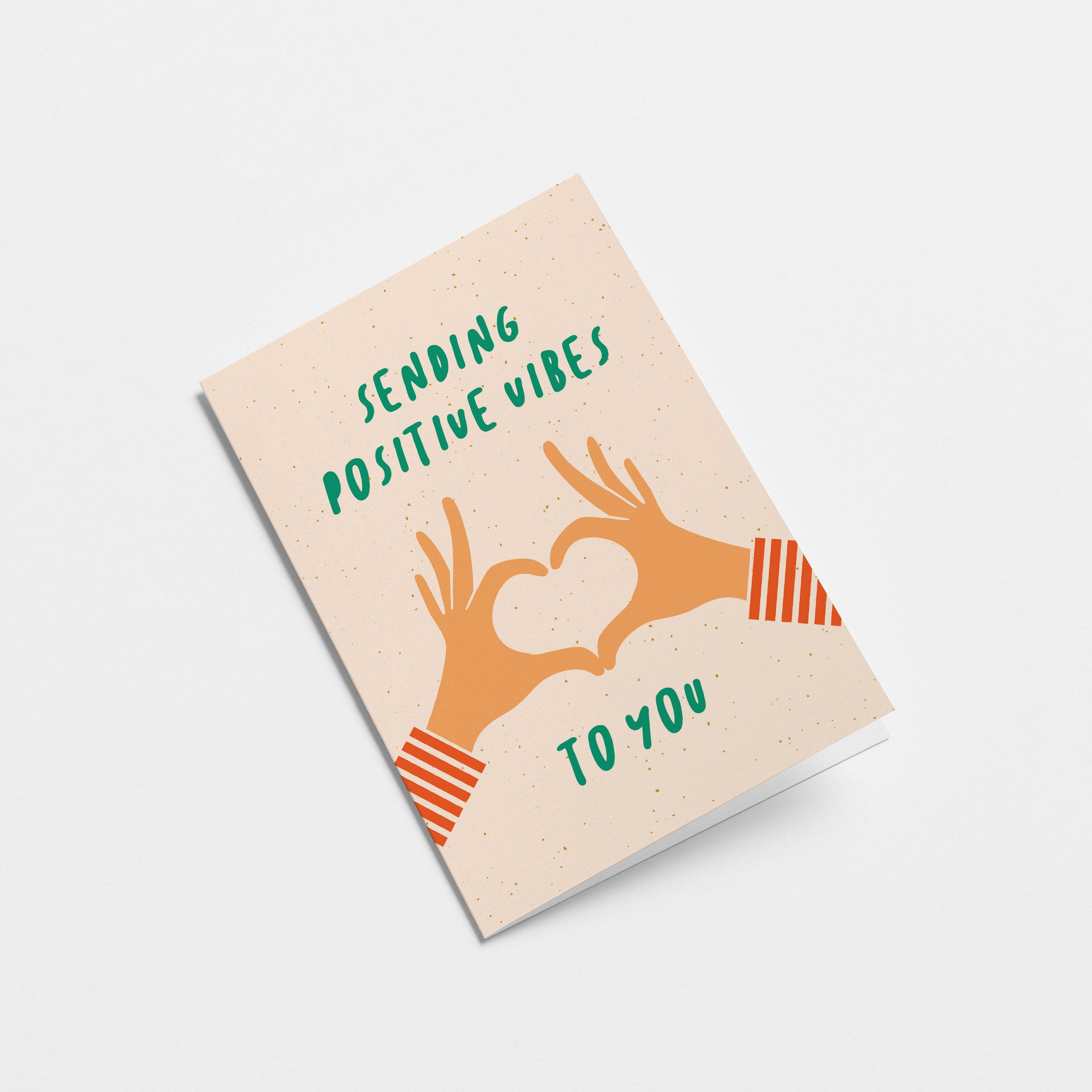 greeting card with two hands creating heart shape with fingers and a text that says sending positive vibes to you Edit alt text