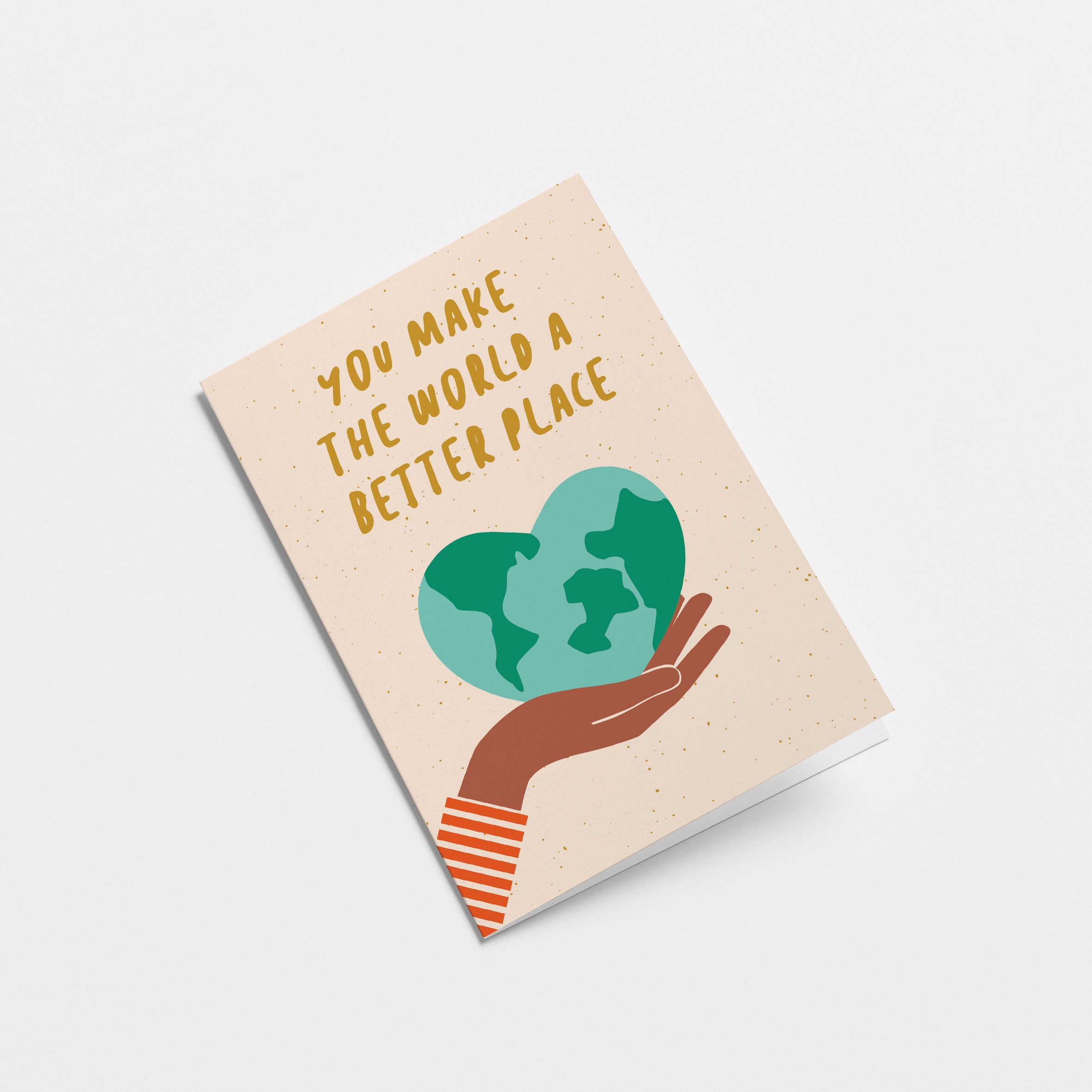 friendship card with a heart shaped earth on the palm of a hand with a text you make the world a better place Edit alt text