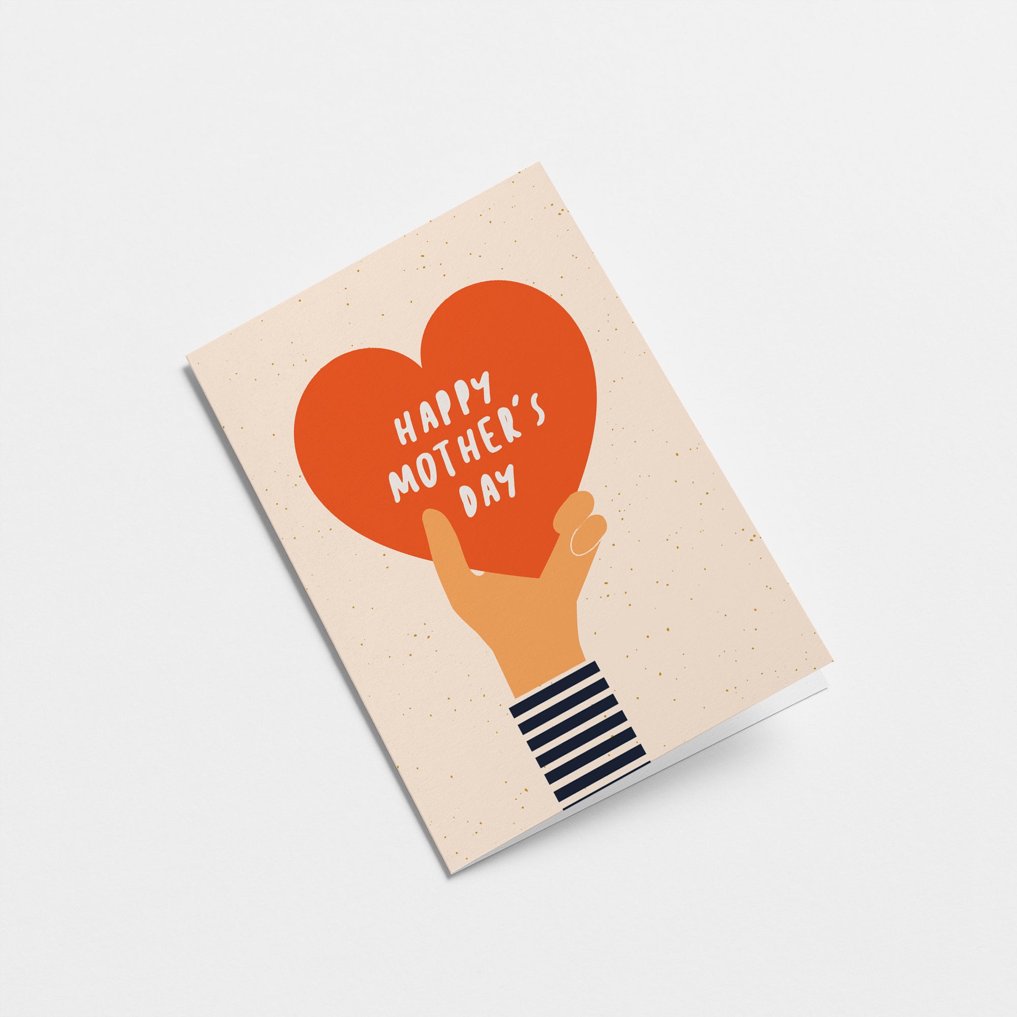 mothers day card with a hand holding a big red heart and a text that says happy mothers day Edit alt text