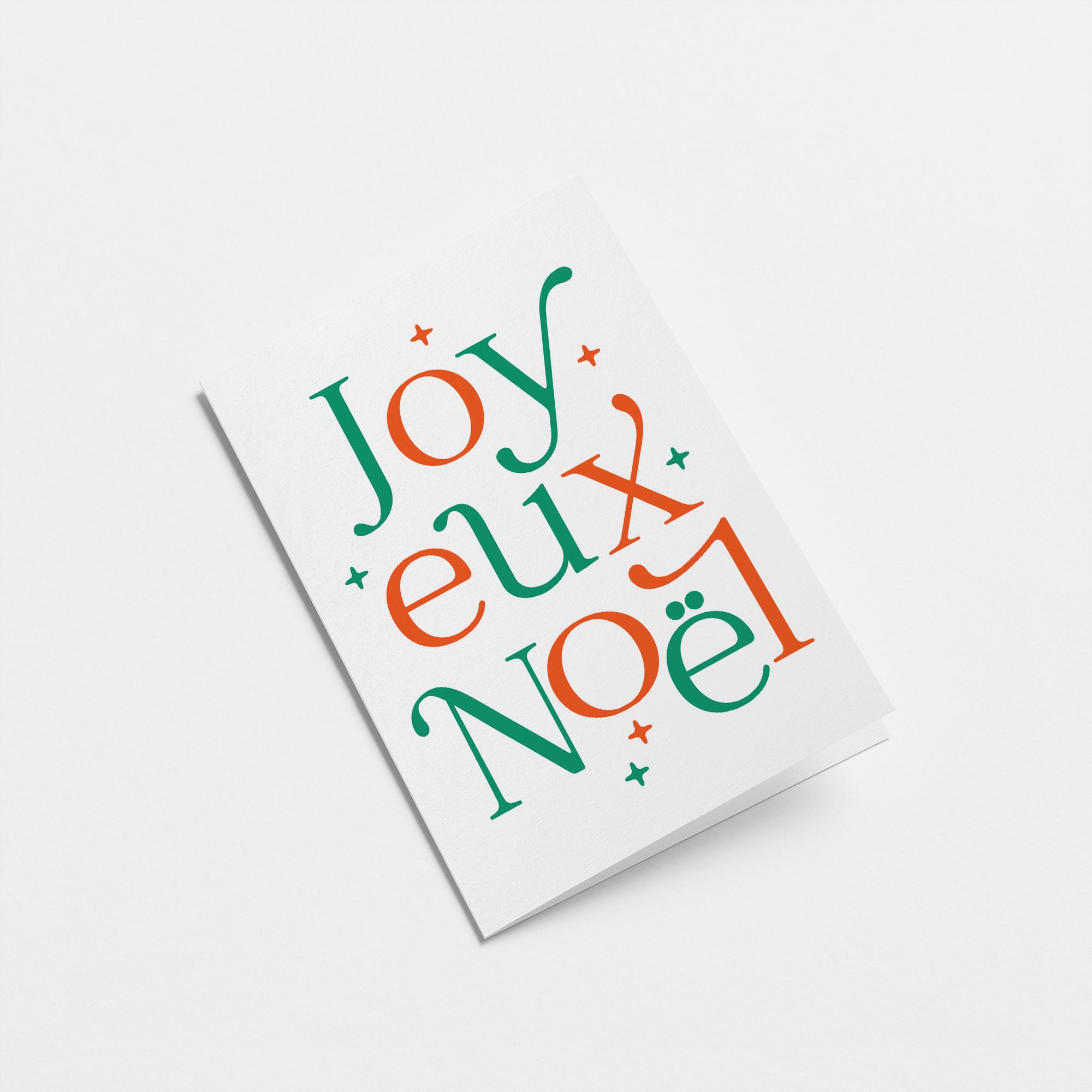 french christmas card with colorful letters that say Joyeux Noël Edit alt text