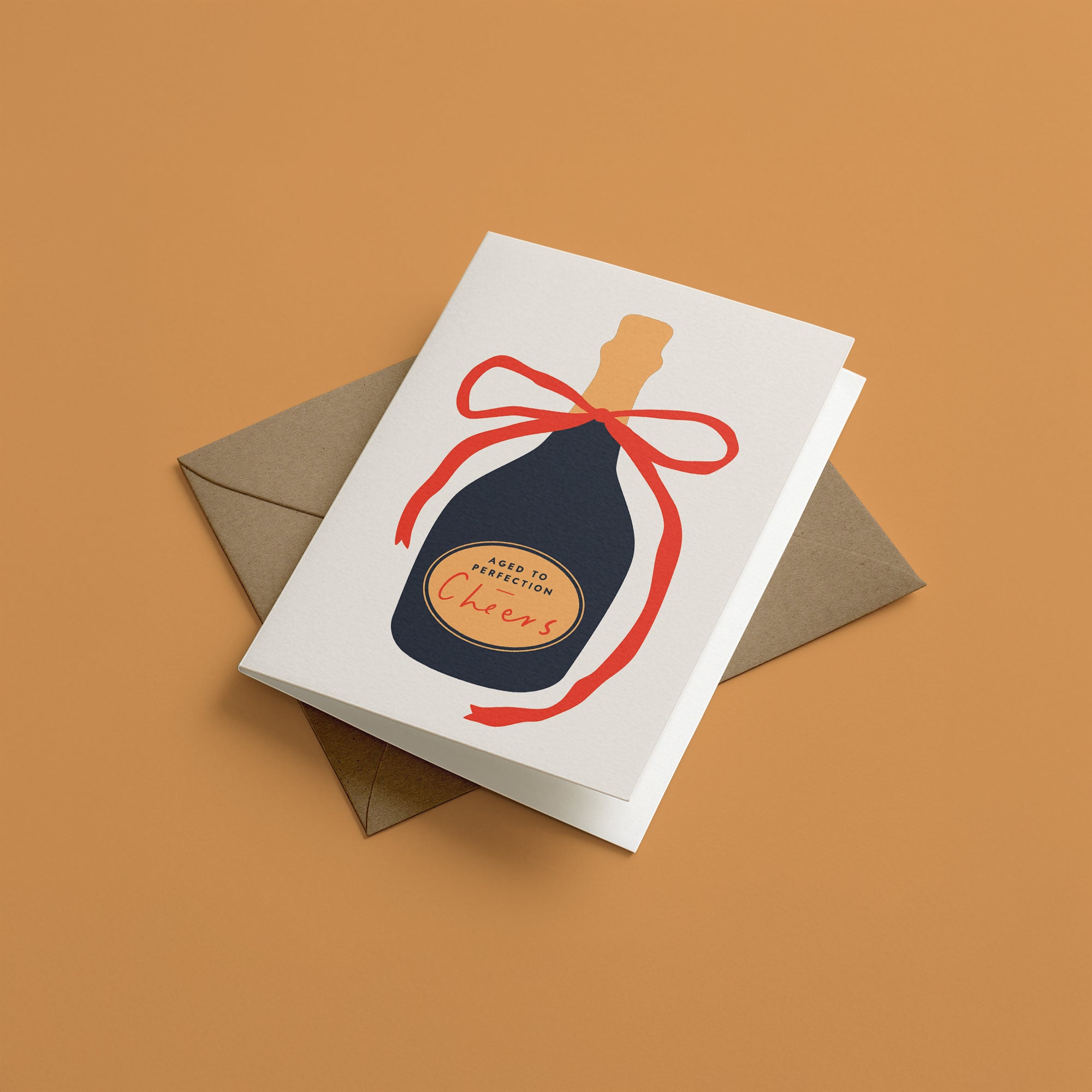 Greeting card with a bottle design and kraft envelope on mustard yellow background