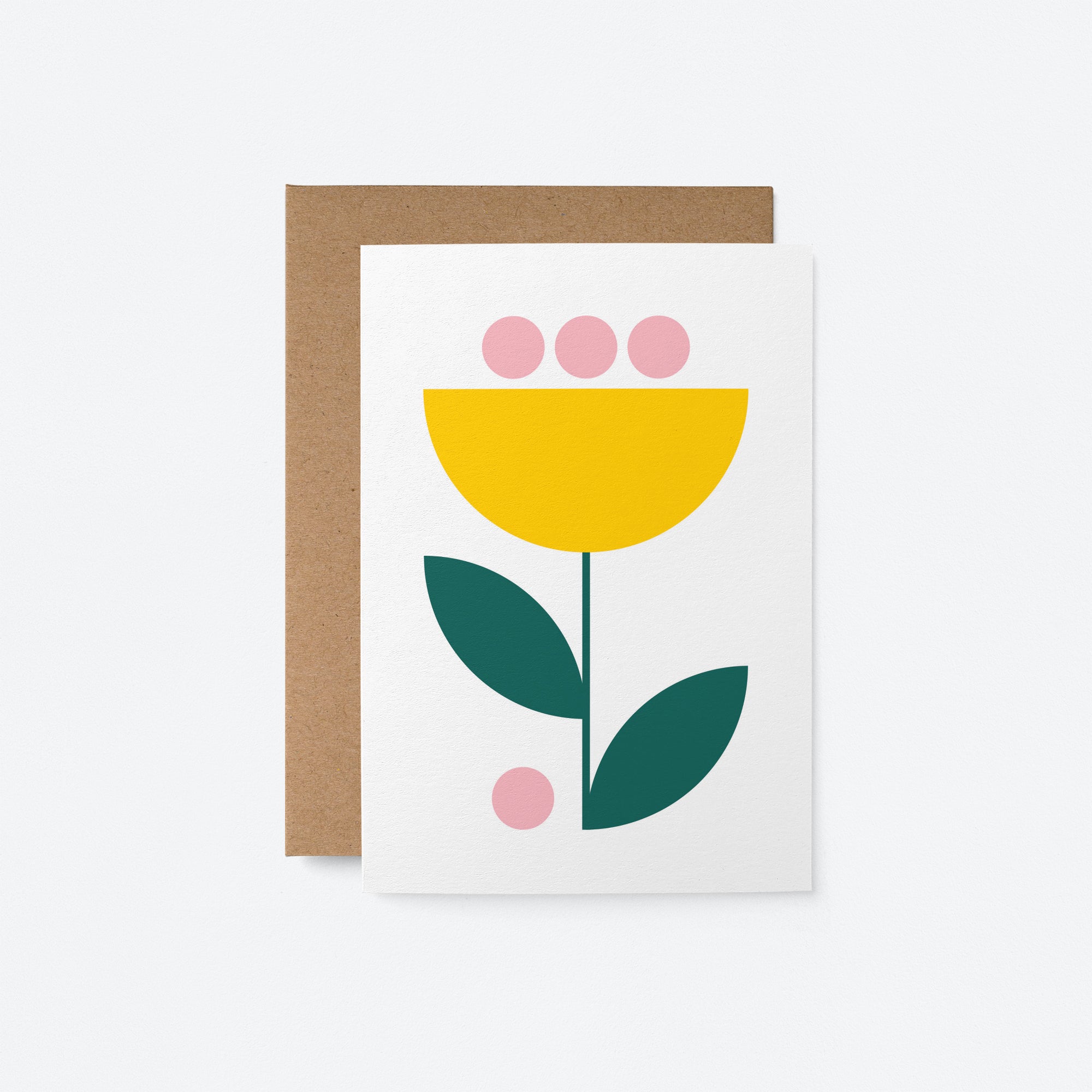 Flower No 28 greeting card showcasing a yellow and pink flower with green leaves on a white background, paired with a kraft envelope.