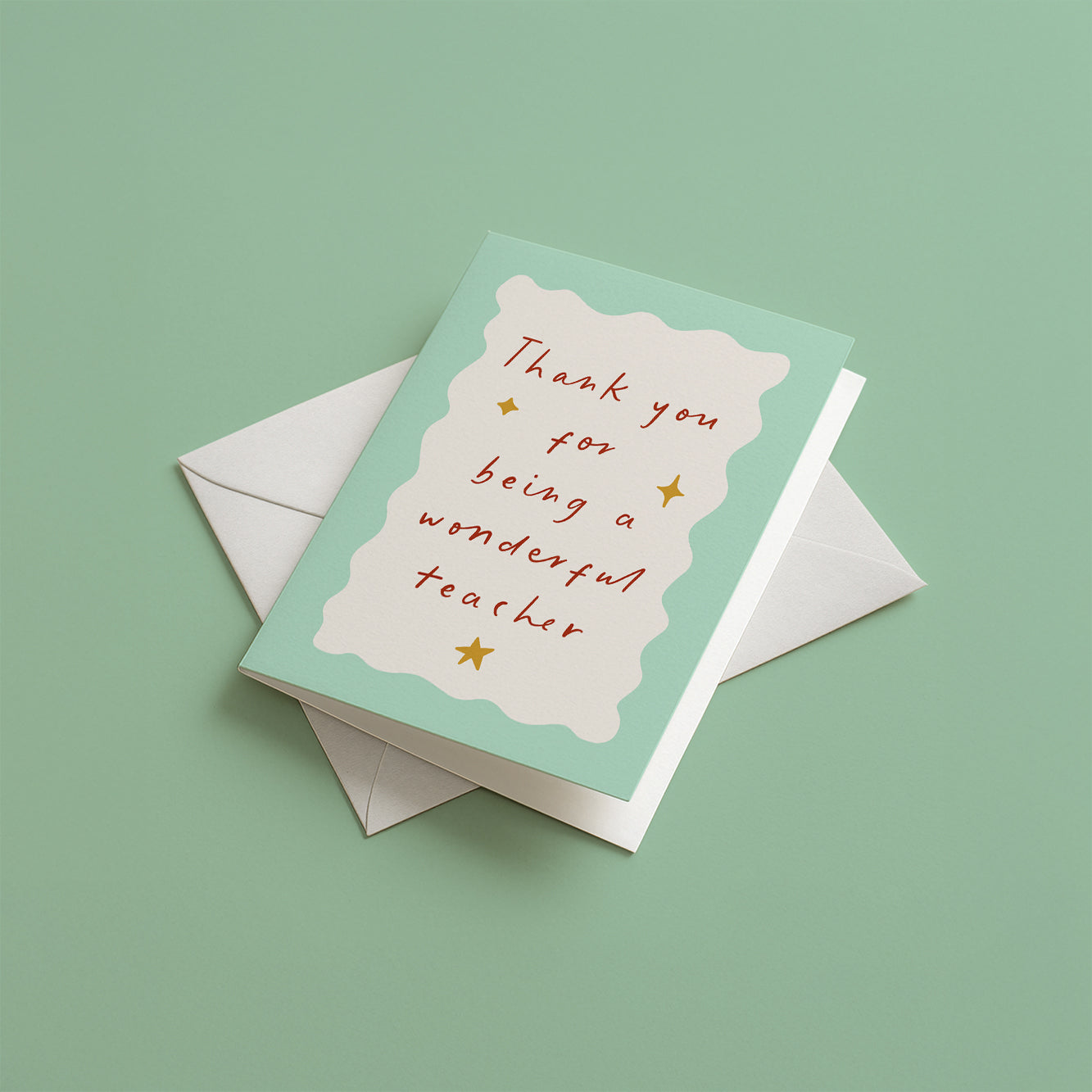 Greeting card with 'Thank you for being a wonderful teacher' text on a green background