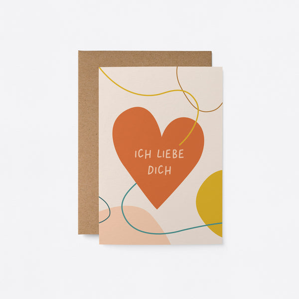 German friendship card with a red heart drawing and a string in it and a text that says Ich liebe dich