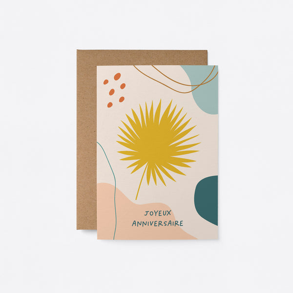 French birthday card with a yellow leaf and colorful figures and a text that says Joyeux anniversaire