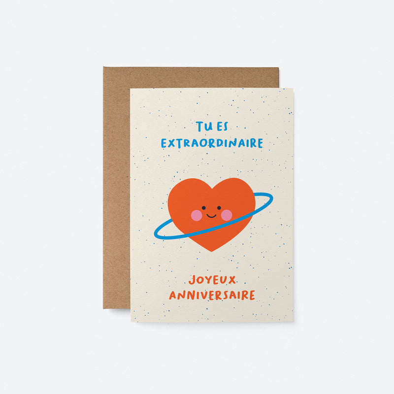 French Birthday greeting card with a red heart shaped planet and a text that says Tu es extraordinaire