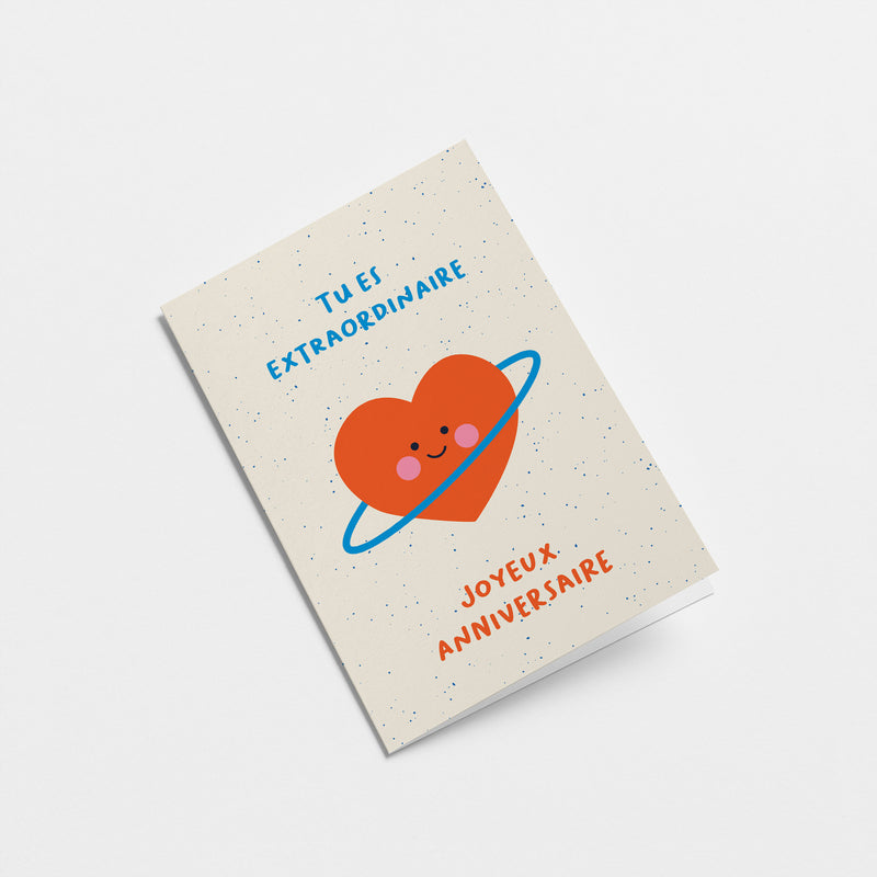 French Birthday greeting card with a red heart shaped planet and a text that says Tu es extraordinaire