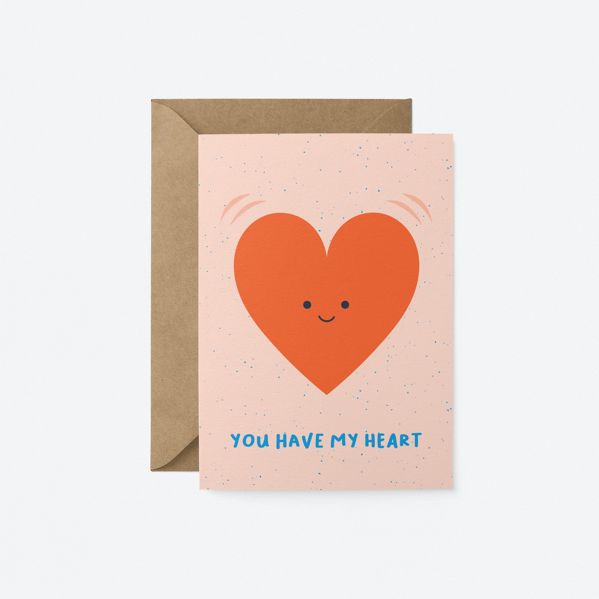 Love card with a red heart shape with a smiley face and a text that says you have my heart