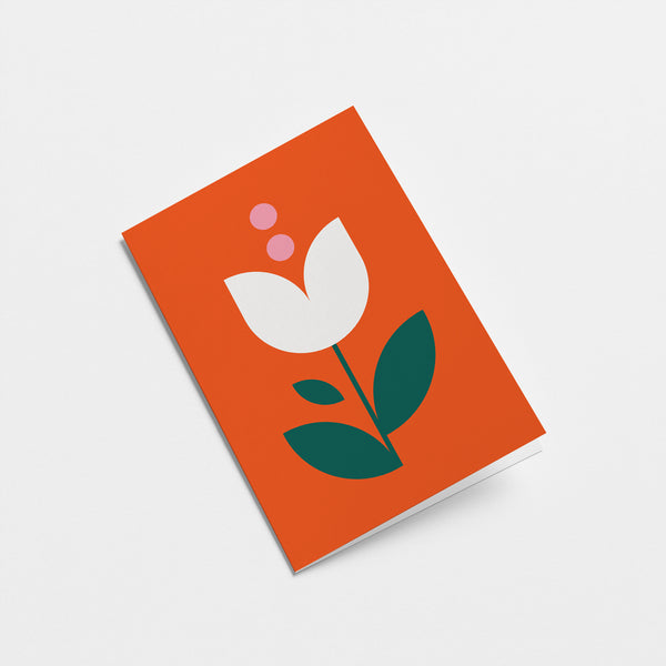 everyday greeting card with a white tulip and green leafs  Edit alt text