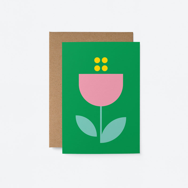 everyday greeting card with a green background and pink flower with blue leafs