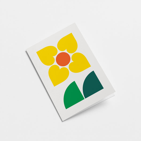 everyday greeting card with yellow and red flower with green, dark green leafs