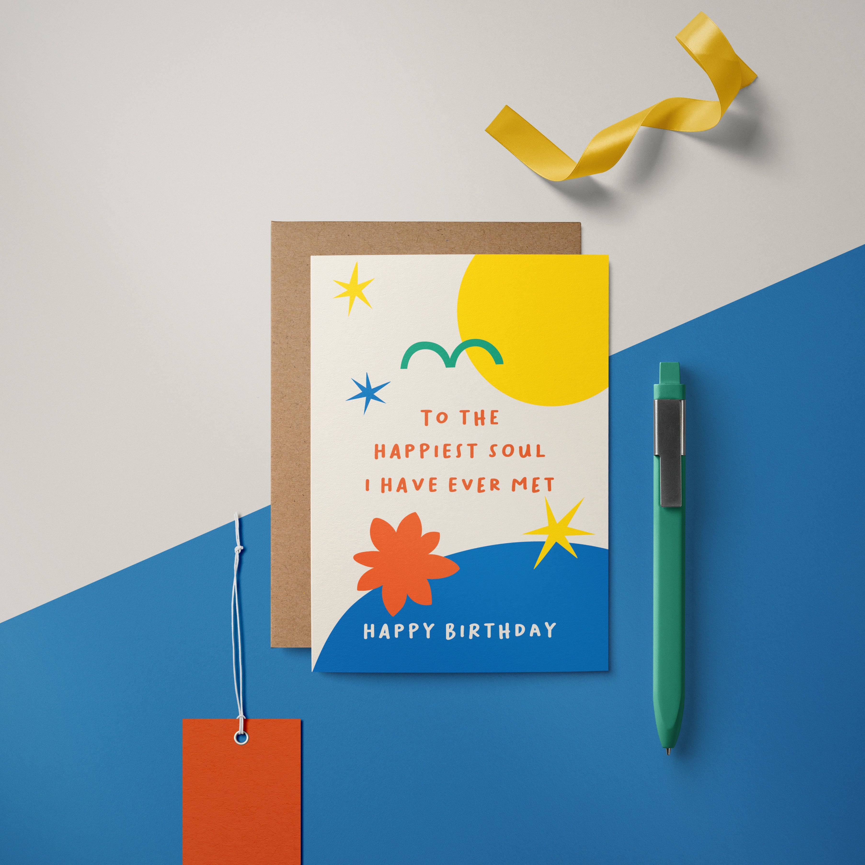 birthday card with yellow sun green bird yellow stars blue figures and a text that says to the happiest soul i have ever met happy birthday Edit alt text  Edit alt text