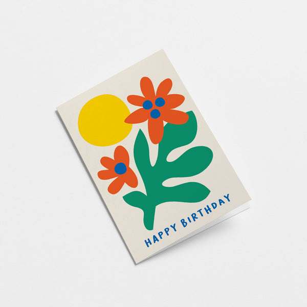 Birthday card with green plant, red and blue flowers and yellow sun with a text that says happy birthday  Edit alt text