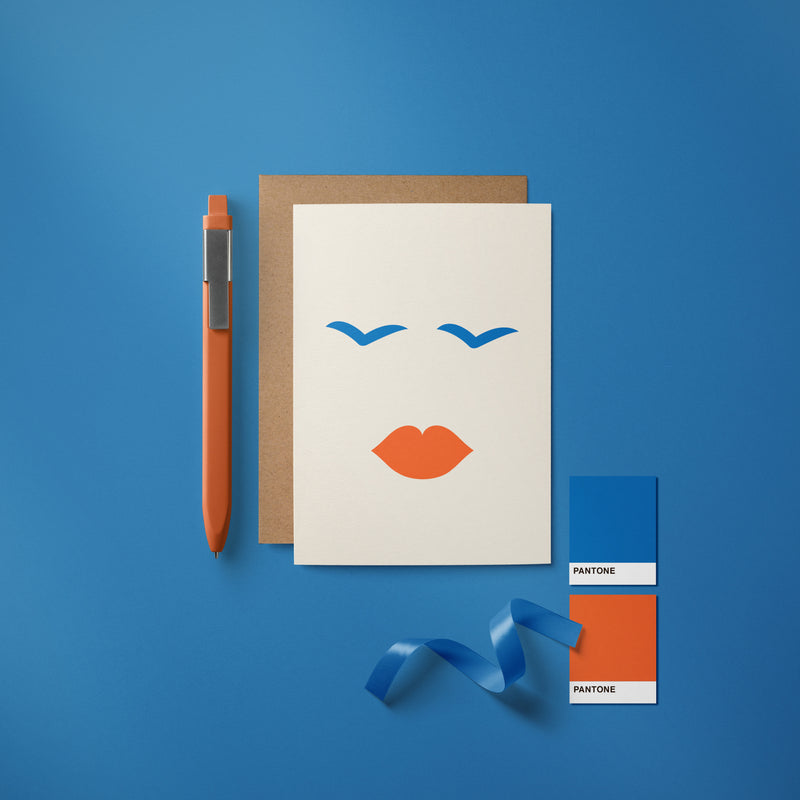 Love card with face shape, red lips, blue eyes  Edit alt text