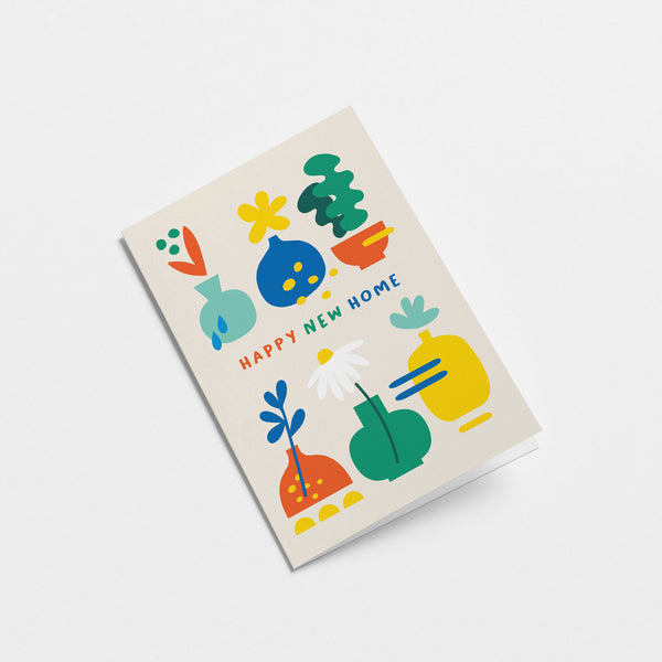 Housewarming card with colorful plants in flowerpots with a text that says happy new home  Edit alt text