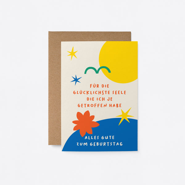 German birthday card with yellow sun green bird yellow stars blue figures and a text that says Für die glücklichste Seele, die ich je getroffen habe, Alles Gute zum Geburtstag