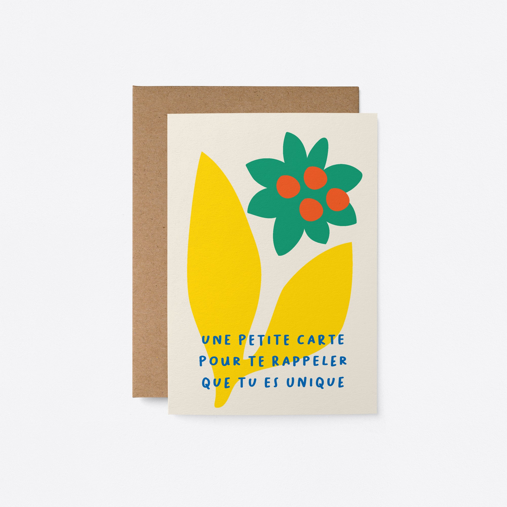 French Love card with yellow leafs, green and red flower and a text that says Une petite carte pour te rappeler que tu es unique