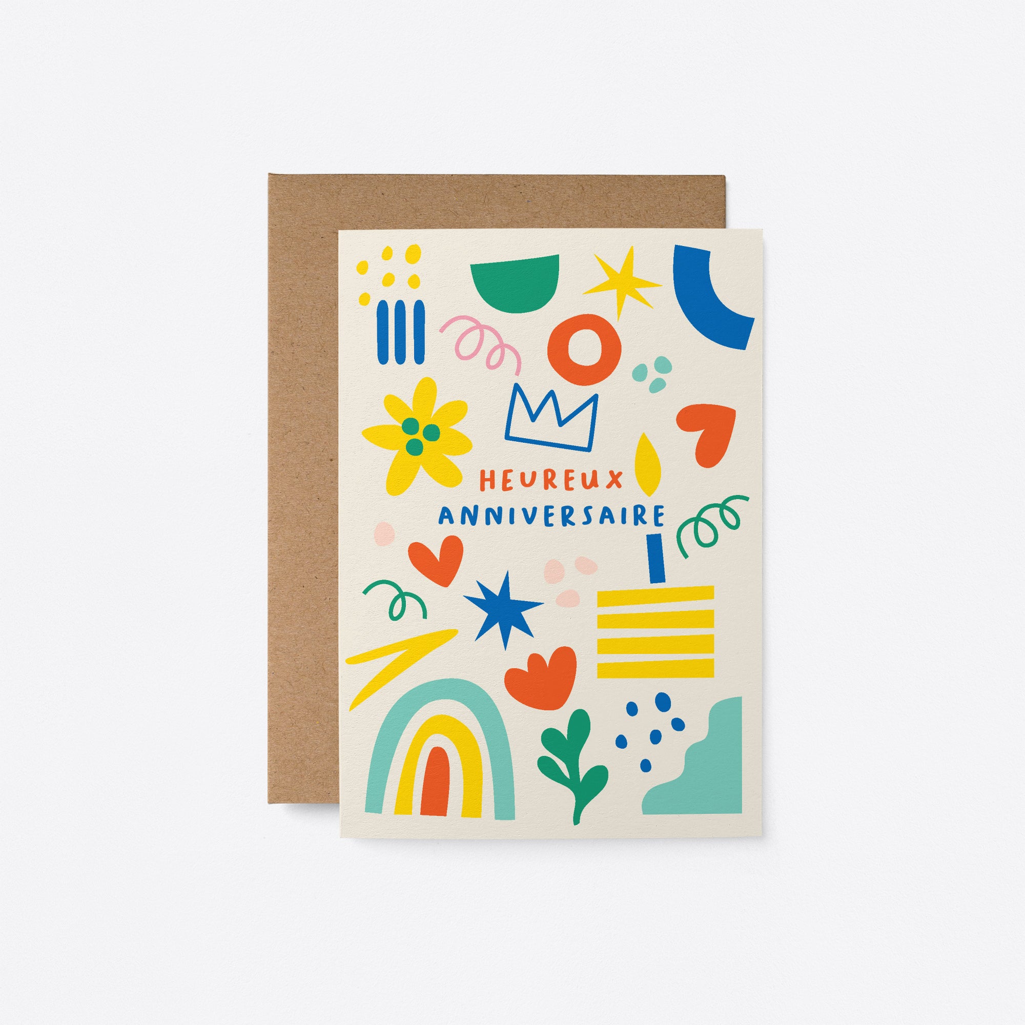 French Birthday card with green, red, yellow, blue figures and a text that says Heureux anniversaire