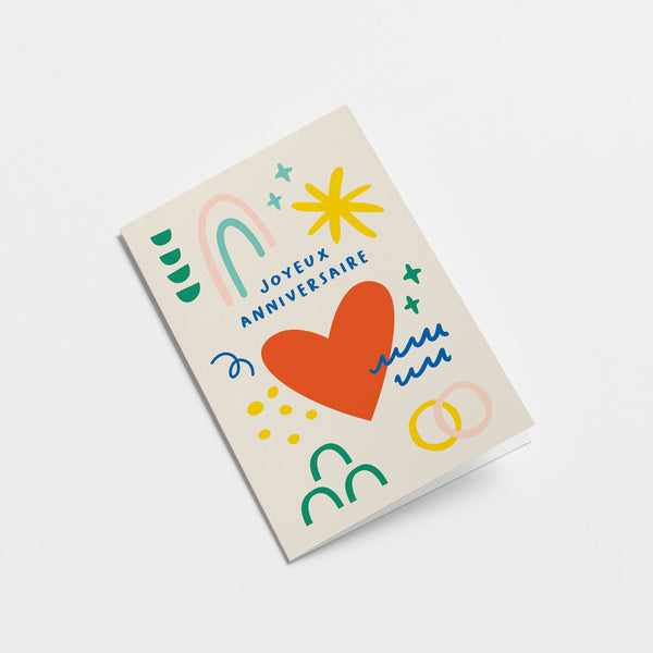 French anniversary card with a red heart, yellow sun, blue, green and pink figures and a text that says Joyeux anniversaire  Edit alt text