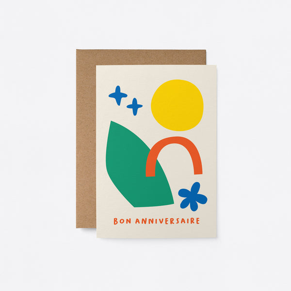 French birthday card with a yellow sun, red, green and blue figures and a text that says Bon anniversaire
