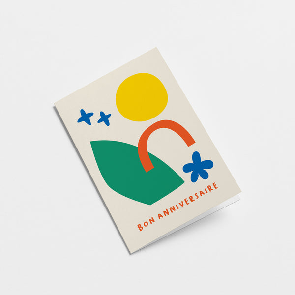 French birthday card with a yellow sun, red, green and blue figures and a text that says Bon anniversaire  Edit alt text