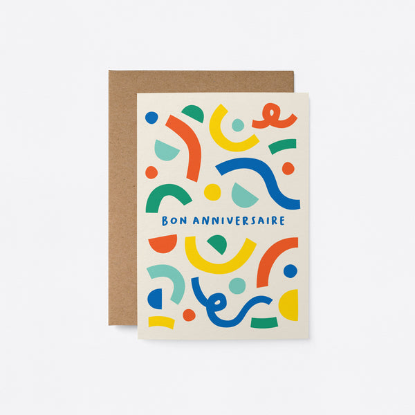 French birthday card with red, yellow, green and blue figures and a text that says Bon anniversaire