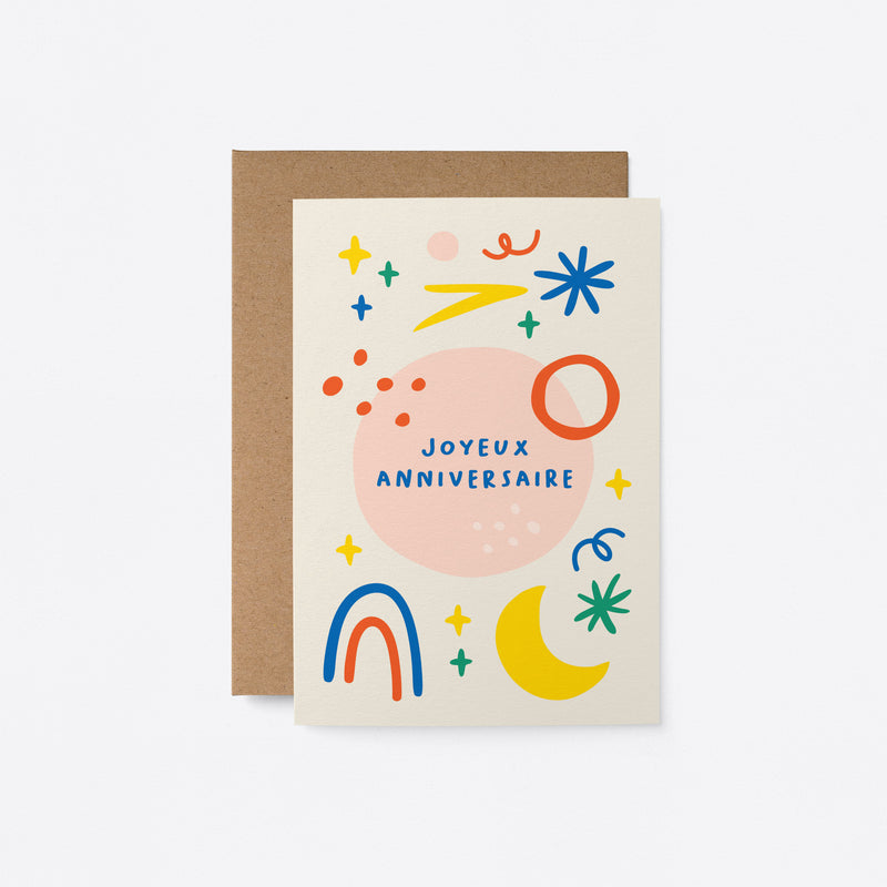 French birthday card with pink, red, yellow, green and blue figures and a text that says Joyeux anniversaire