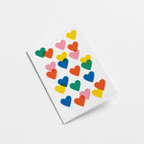 love card with colorful heart shapes  Edit alt text