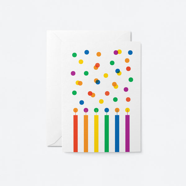 birthday card with six birthday candles in different colors and lots of colorful dots