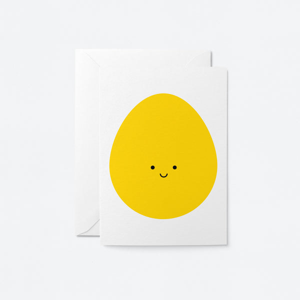 easter card with a yellow egg with a smiley face
