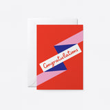 congratulations card card with red, pink and dark blue shapes with a text that says congratulations