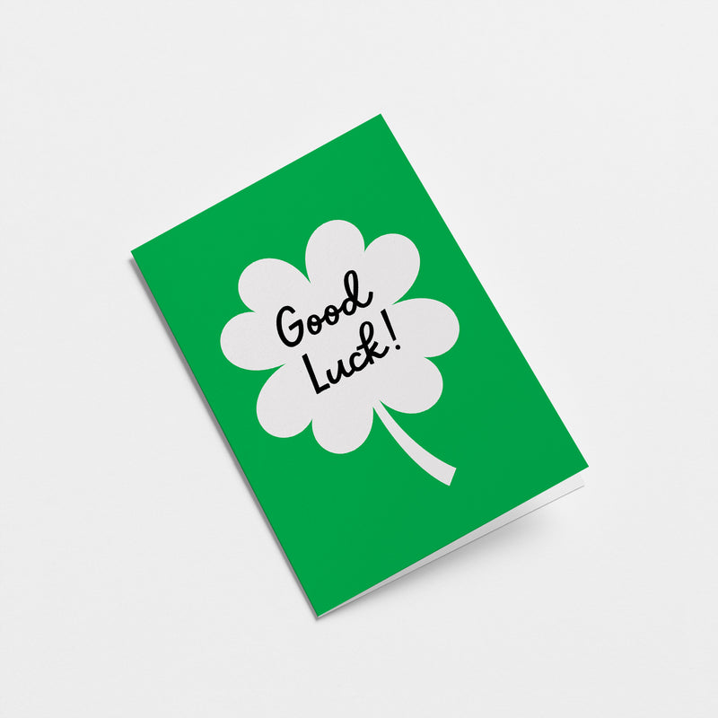 good luck card with a four leaf clover with a text that says good luck  Edit alt text
