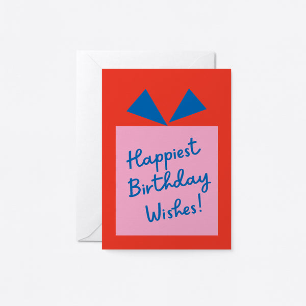 birthday card with a pink gift box with a text that says happiest birthday wishes