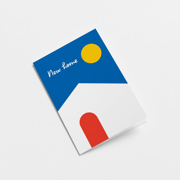 housewarming card with a white house, red door, blue sky and yellow sun and a text that says new home  Edit alt text