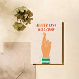 Friendship card with a hand with fingers crossed and a text that says Better days will come  Edit alt text