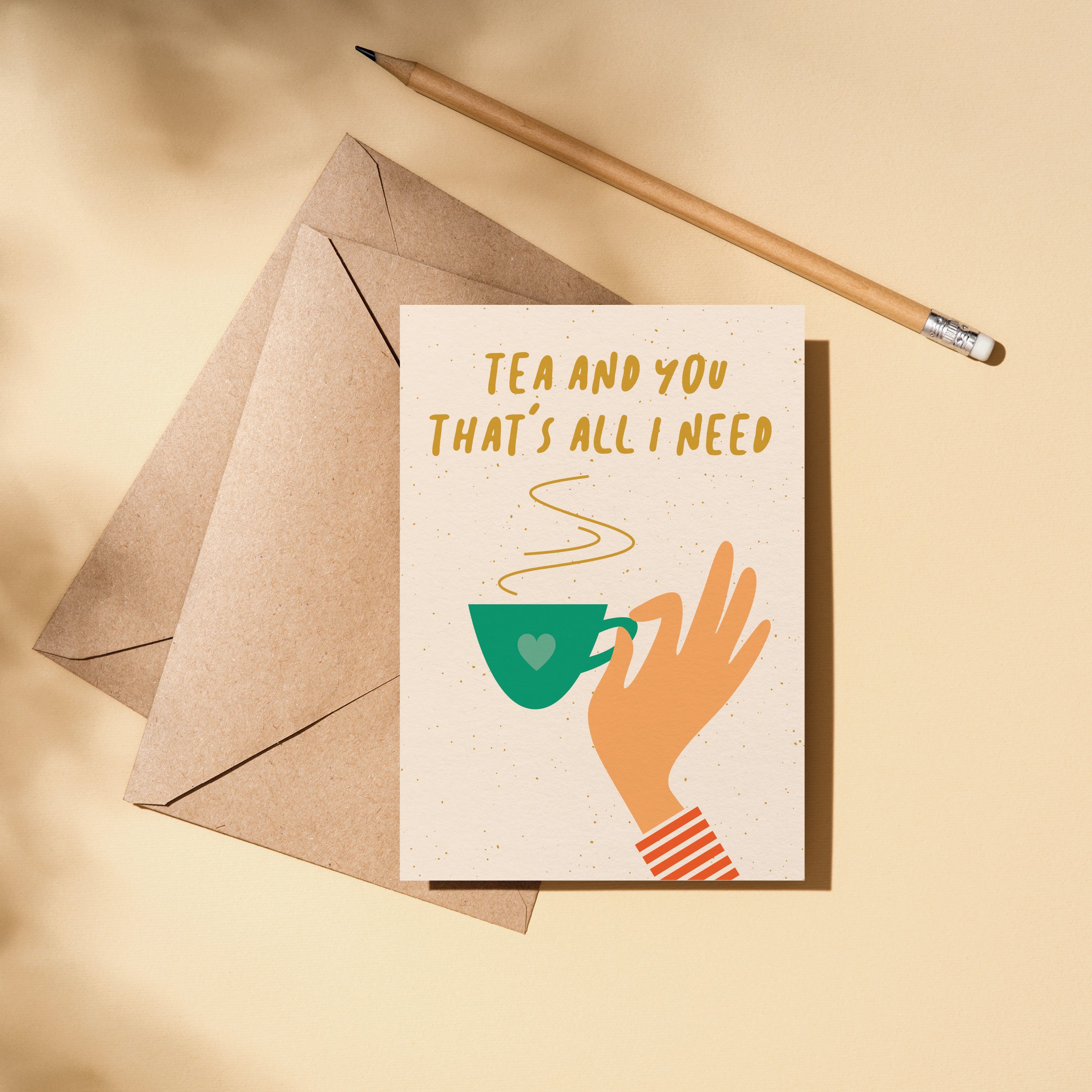 friendship card with a hand holding a green tea cup and a text that says tea and you that’s all i need  Edit alt text