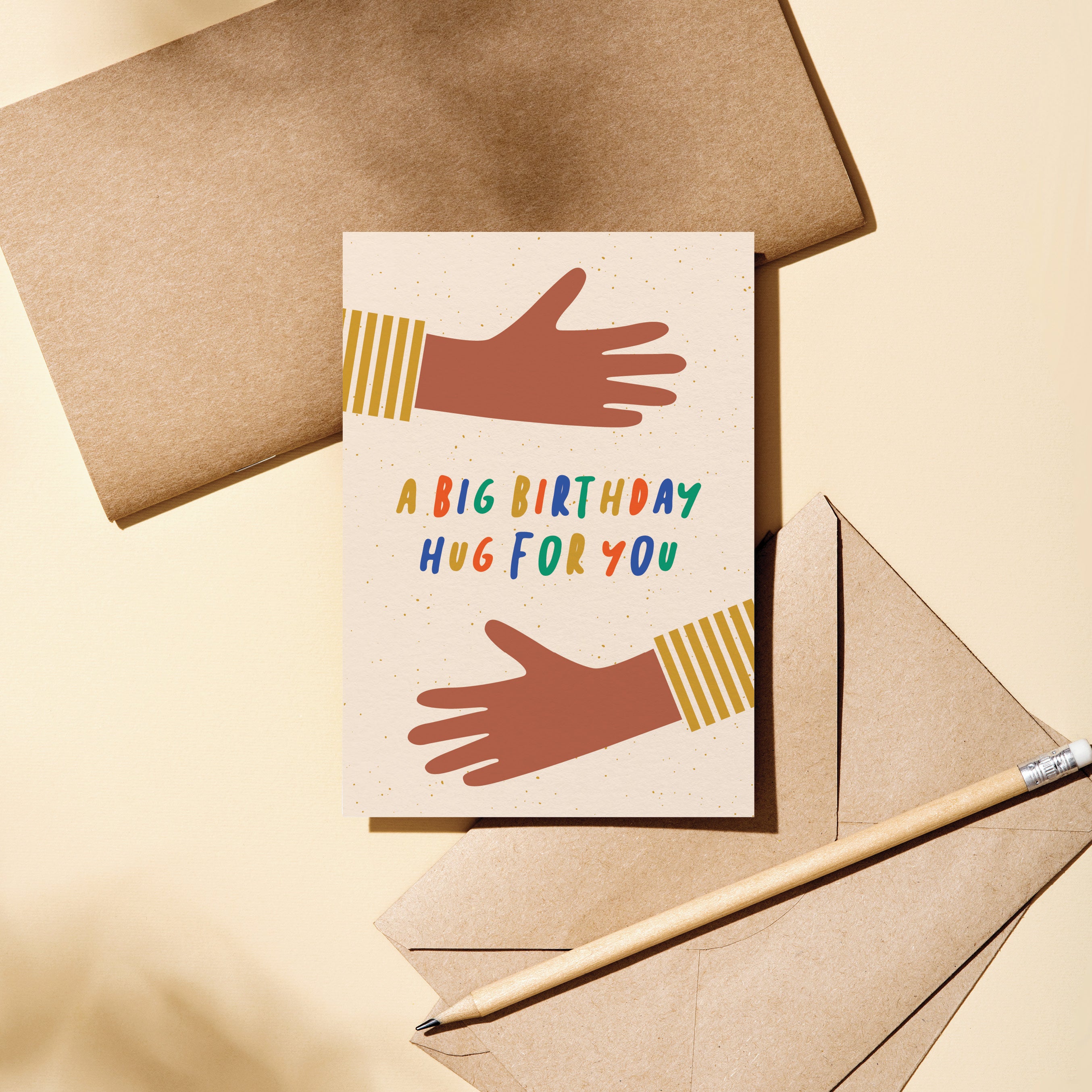 birthday card with two brown arms hugging with a text that says a big birthday hug for you  Edit alt text