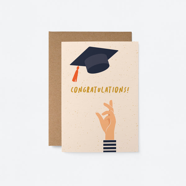 congratulations  graduation card with a hand throwing black graduation hat and a text that says congratulations
